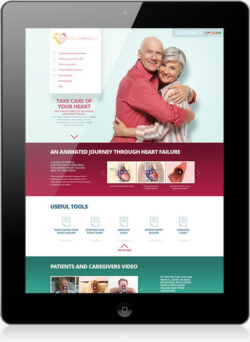 Une tablette affiche un site web sur la santé cardiaque créé par une agence web à Nice. On y voit un couple âgé qui s'étreint, la navigation du site sur la gauche, des graphiques de cœurs animés, des outils utiles et une section pour des vidéos de patients et de soignants.