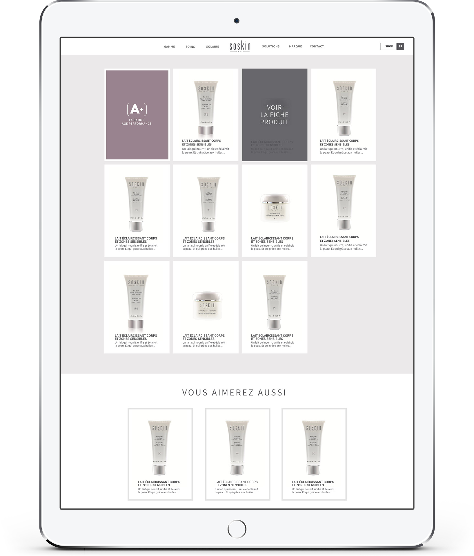 Une tablette affiche un site de création internet pour les produits de soin de la peau Soskin, présentant une grille d'images de produits avec des descriptions en français et une section "Vous aimerez aussi" proposant des suggestions de produits supplémentaires.