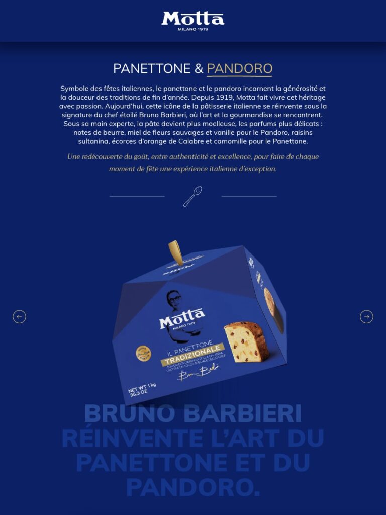 Boîte de panettone de la marque Motta, portant la signature du chef Bruno Barbieri et représentant une part de panettone à côté de l'inscription « Il Panettone Tradizionale ».